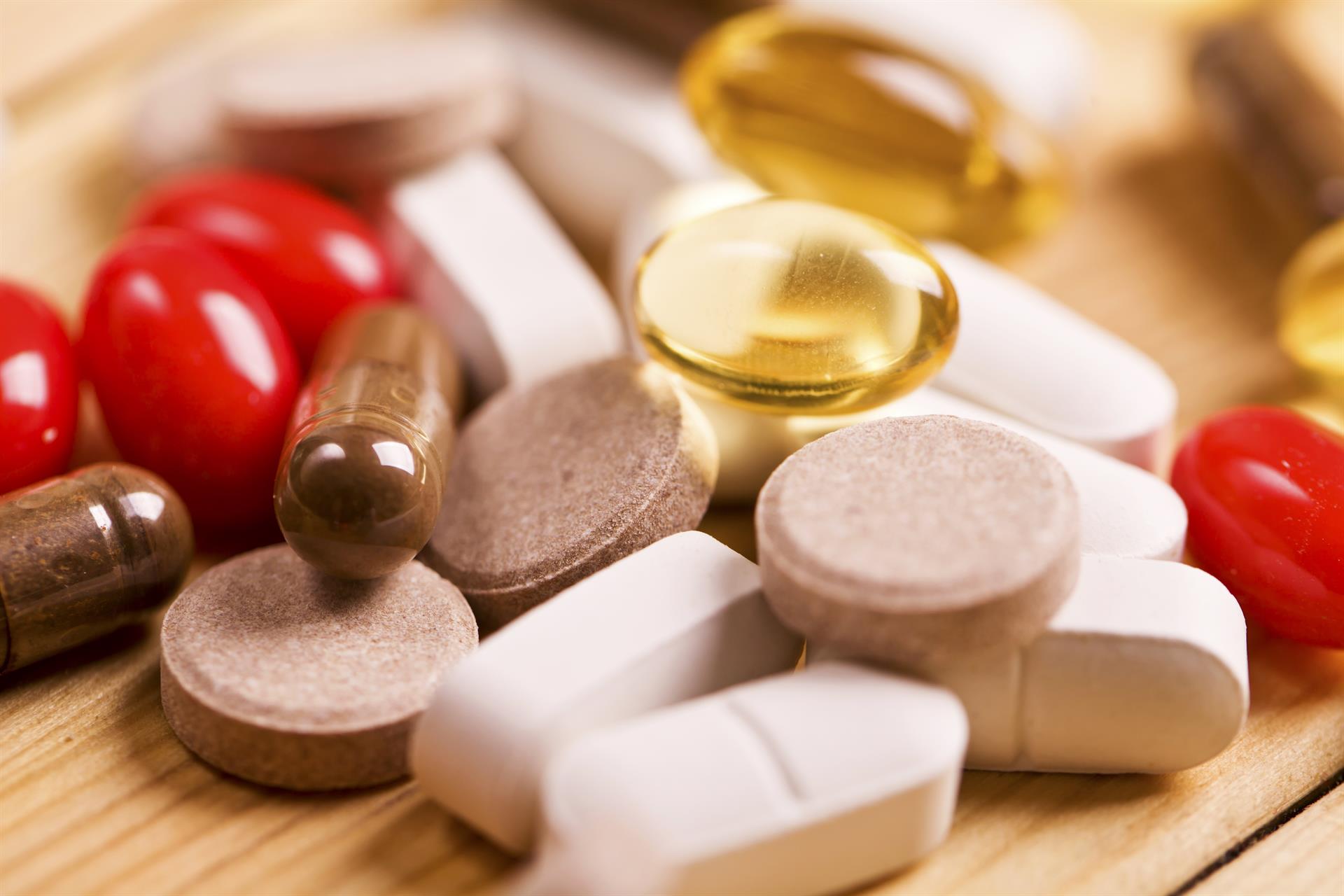 Closeup image of pills and capsules. 